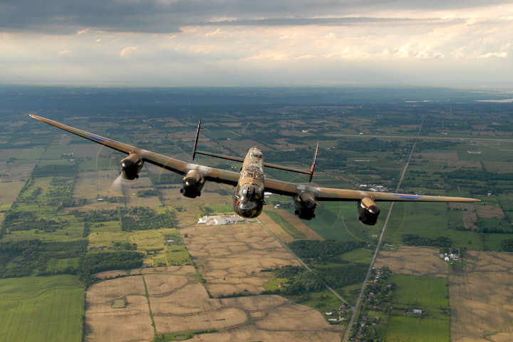 	
The CWH Lancaster is seen from the tail of the museum’s B-25 Mitchell. (E.D.)