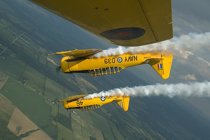 Harvards performing a three-plane loop by Eric Dumigan