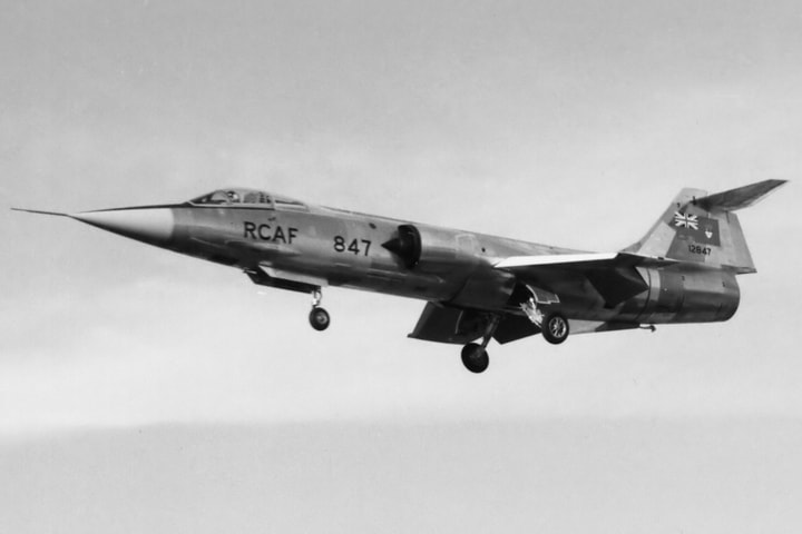 Factory-fresh Starfighter 12847, lacking roundels, is seen landing at Cartierville. (E. D.)