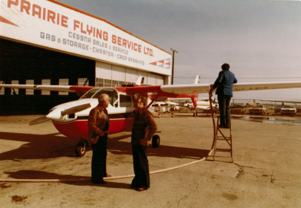 L–R: John Howe with brother Tom, in front of a Cessna Skymaster ​(© John Howe)​