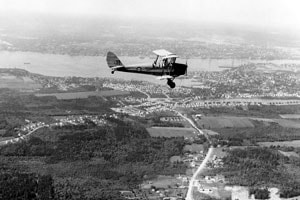 Former RCAF Tiger Moth 8865 joined the Navy as VG-TGF. In the interregnum between the two service periods it was owned by the Ottawa Flying Club as CF-CJH. The photo is circa 1955 when it was given a new lease on life as a station hack at Dartmouth. ​(DND DNS-14607-2 via the TONY STACHIW collection)