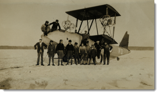 Showing  the Vancouver in various states of dismantlement, as the wings, engines and tail were removed to make the aircraft easier to lift out of the ice.