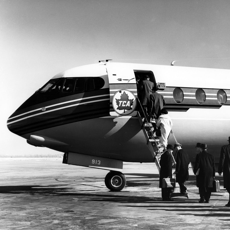 Vickers Viscount Airliner of TCA being boarded by businessmen